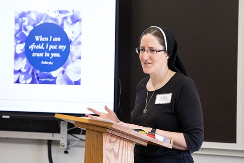 photo of a nun teaching a masters in theology class